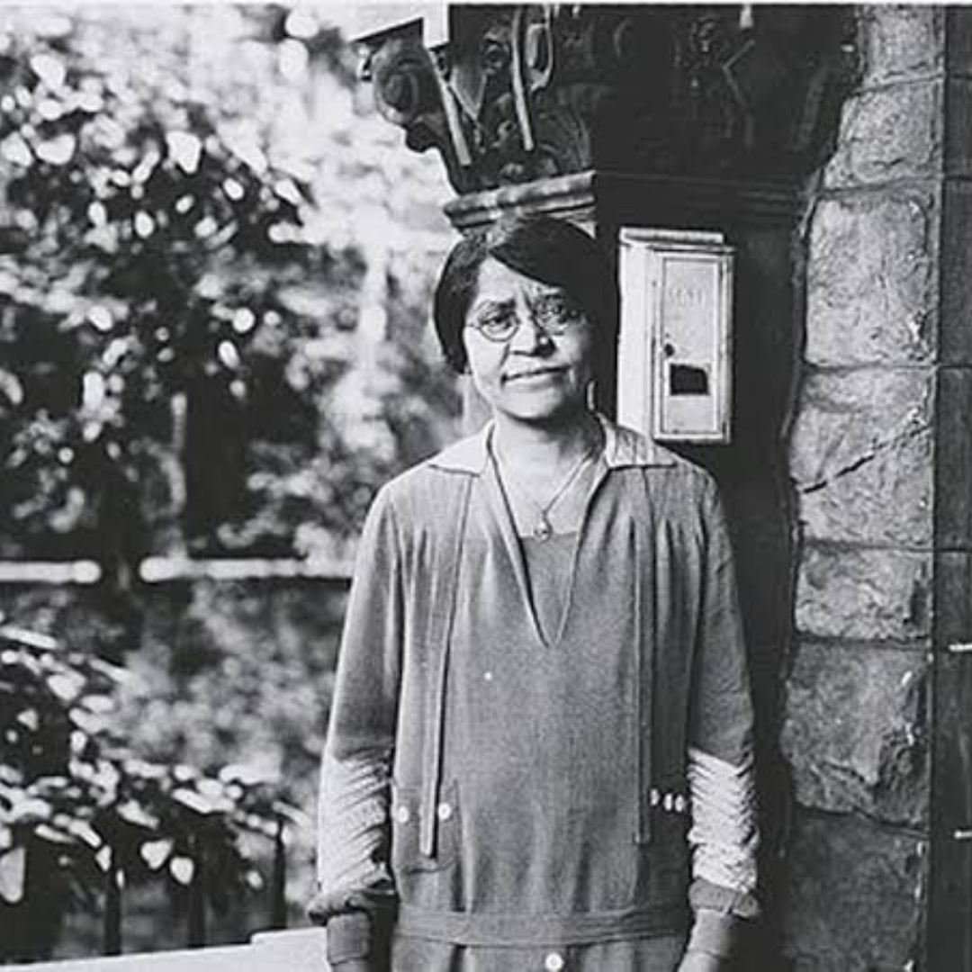 Annie Turnbo Malone standing outdoors as an older woman image