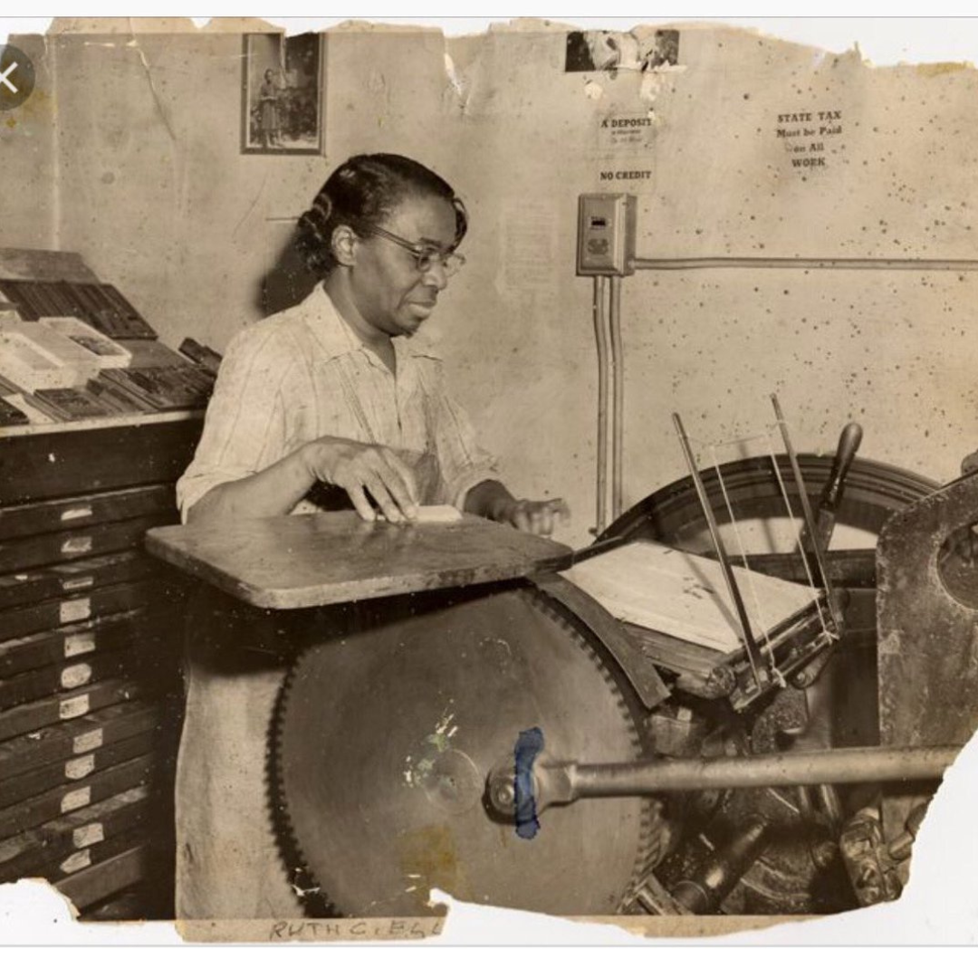 Ruth Ellis working printing press image